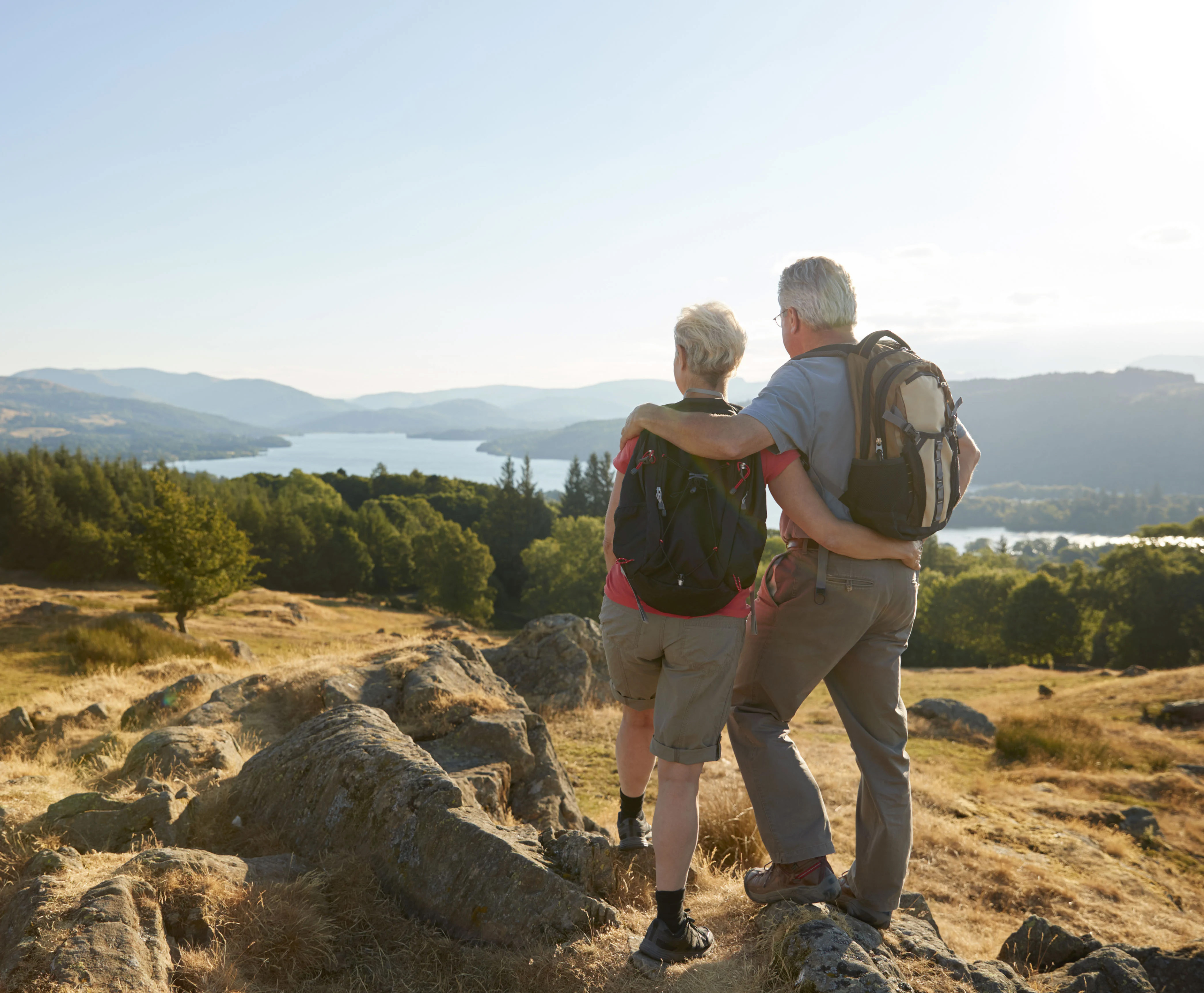 retired couple on top of a mountain